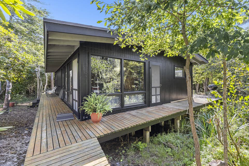 A Midcentury Cottage Surfaces on New York’s Fire Island for 975K Dwell