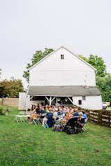 Our guests seated at the ceremony next to the barn.
