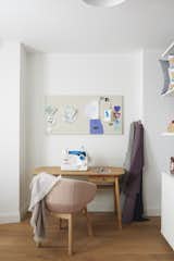 Meghan also has a sewing station in the basement to make goods for her Etsy store, called Hartley Jones Design. “It's my own space to be creative, design, and work at my own pace,” she says.  Photo 12 of 21 in Before & After: Just-Right Furnishings and a Few Shades of Paint Punch Up a Brooklyn Brownstone