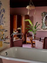 Four suites feature a clawfoot bathtub at the center of the room.  Photo 4 of 7 in Baltimore’s New Ulysses Hotel Channels the Kaleidoscopic Ouevre of Filmmaker John Waters