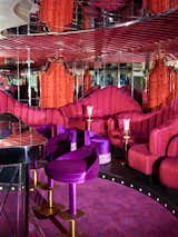 The hotel’s late-night cocktail lounge, Bloom’s, is decked out in mirrored walls and ceilings, purple velvet bar stools, and pink tufted banquettes.
