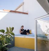  Photo 4 of 21 in This 506-Square-Foot Apartment Lives Large With Cheery Yellow Interiors and an Outdoor Soaking Tub
