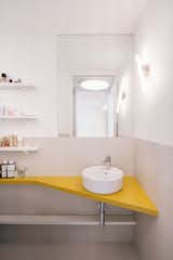 This 506-Square-Foot Apartment Lives Large With Cheery Yellow Interiors and an Outdoor Soaking Tub - Photo 20 of 20 - 