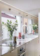 This 506-Square-Foot Apartment Lives Large With Cheery Yellow Interiors and an Outdoor Soaking Tub - Photo 9 of 20 - 