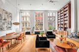 Set in a historic 19th-century building, the $4.4M apartment comes with 14-foot-tall ceilings, four bedrooms, and a wood-clad chef’s kitchen.