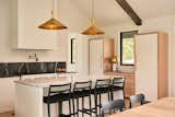 Oak cabinetry is featured in both the kitchen and laundry room of the home.&nbsp;