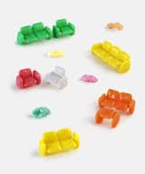 This seating collection comprises tablets of Chickles gum, while chewed pieces are scattered about the space as sculptures.