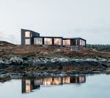 U.K. design firm Koto’s proof of concept for their new venture in architect-designed modular residences is in North Uist, an island in the remote Outer Hebrides of Scotland. The roughly 2,200-square-foot, four-bedroom home carries the company’s characteristic sculptural forms, jet-black yakisugi cladding, and Japandi aesthetic.
