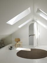 Skylights now fill the refreshed attic with sunshine.