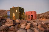 The multicolored desert home includes a secluded backyard with firepit and hot tub.&nbsp;