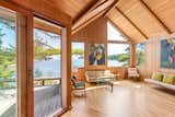 As with the exterior, wood reigns inside. The main living areas feature cherry walls and floors. Mahogany windows frame striking views of the nearby harbor.