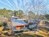 Award-winning architect Joseph Amisano used concrete, glass, and steel to create this U-shaped residence in 1955.
