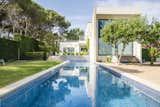 Listed for €2.95M, this stone-clad Costa Brava home comes with plentiful patio space and a sparkling pool.
