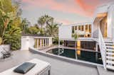 "The centerpiece of the home is the black-pearl PebbleTec pool, which features striking color and dynamic visual patterns that transform the varying seasons and sun angles,