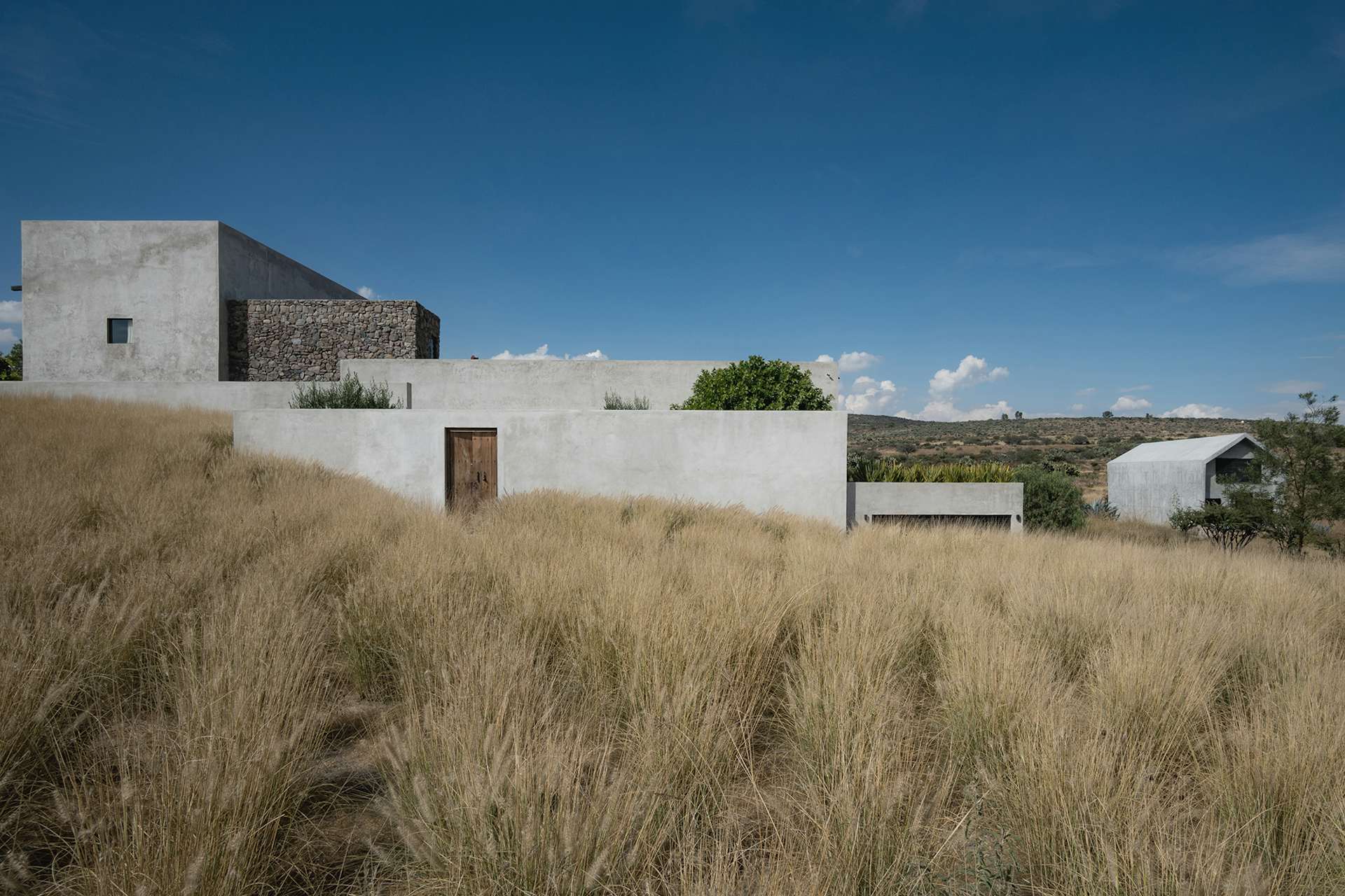 Photo 1 of 10 in Concrete Is King in This Monumental Home That Just Hit