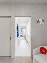 A bathroom connects the children’s bedrooms. The bedrooms are in the front of the home, and the common rooms are in back. The layout “lends itself to fully utilizing the yard,” says Danielle. “And when we have guests in the ADU, we have the privacy of going to our room in the front of the house and closing the door.”