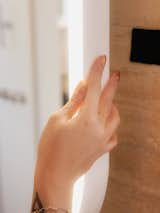 Detail of light integrated within bathroom mirror. 