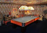 Colorful fabric covers the walls and ceilings in Graceland’s pool room.