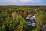 The renovations retained the existing footprint of the main living spaces, added a new primary bedroom suite, and relocated the garage.