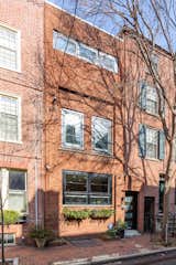 Set on a quiet street, the brick-clad home is conveniently located just minutes away from numerous attractions, including Washington Square Park and Headhouse Square.
