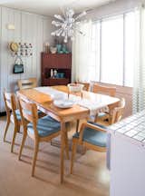 The light-filled dining room is conveniently located between the kitchen and living area.