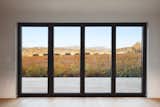 "Our DNA is rooted in performance as the company founders are mechanical engineers,  Photo 5 of 6 in With a Spectacular Glass Wall, the Dwell House Folds Open to Nature