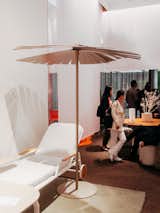 This umbrella was staged with a chair so unusual that it is worth mentioning: The Capa outdoor lounger looks pretty standard, but was covered in a nubby fabric designed to evoke a sense of hygge, even when it’s hot out. That it’s durable enough to be outdoors is innovative, but I personally cannot imagine wanting to lie on anything even vaguely resembling bouclé when the sun is high in the sky.