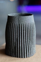 Einārs Timma combined an ancient material with modern technology to create his collection of 21st-century pottery. Each vase is 3D printed from black volcanic sand, and the finely finished smooth and textured surfaces show just how far the production method has come.