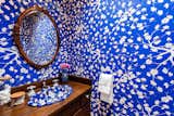 A pattern like this could be overwhelming in a larger space, but is perfect for a powder room.&nbsp;