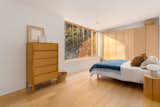 Bedroom of Scandinavian-Style Bowen Island Home by Chris Hunter