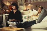 Townsend deliberately contrasted the neutral tones and materials of Sam’s Seattle houseboat with maximalist pinks and floral patterns in Annie’s Baltimore apartment.  Photo 4 of 5 in How the “Sleepless in Seattle” Houseboat Gave the Hit Rom-Com a Dose of Realism