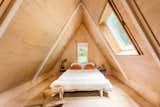 Principal Bedroom of Pine Hill A-Frame by Studio Bunkley