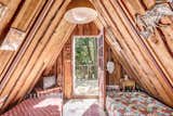 Before: Bedroom in Pine Hill A-Frame by Studio Bunkley