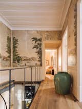 Well-preserved frescoes line the hallway that connects the home’s upper-level bedrooms.&nbsp;