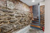 Original stone and brick walls are just a few of the period details that can be found throughout the home.