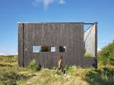Slices in This Compact Cabin in Northern France Frame the Coast Like a Camera