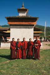 About an hour and a half’s drive from Ogyen Choling, the Choekhar Valley is considered the spiritual heartland of Bhutan, where Buddhism first arrived in the country. A group of monks pose at the five-day Jambay Lhakhang festival, which celebrates the namesake temple’s founding in the seventh century. The festival launches around midnight with practitioners in decorative masks—and nothing else—performing Tercham, or the Naked Dance, in honor of Guru Rinpoche. Bhutan is known for its colorful religious festivals, where locals often share puffed rice, tea, and ara (a traditional alcoholic beverage made from rice or wheat).