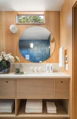 Blue tile in the bathroom connects with other small moments of color.  Photo 8 of 8 in Northern California’s Sea Ranch Is a Bucket List Stay. And It Just Reopened Its Rooms