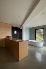 Bathroom in Hideaway House by Measured Architecture