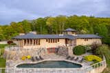 200 Long And Winding Road in Garrison, New York, is currently listed for $3,999,000 by John Oliveira and Stacey Pinkas of Douglas Elliman.Crafted from cedar, glass, and stone, this 3,625-square-foot residence sits on nearly 32 acres with access to the Appalachian trail.