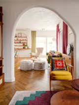 At the end of the living room, sliding glass doors lead to the terrace, which is as large as the apartment and provides additional entertaining space in warm months.