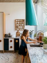 In Portugal, local marble can be a cost-effective material—Fala used five types in the house. It forms a kitchen counter that runs into the floor of a landing and then up the stairs and it even shows up on the facade.