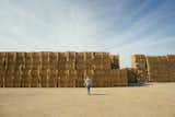 Disposing of straw bales, a waste product, requires time and effort, says Johnson. Instead of discing it back into a field, farmers could sell it as a building product to the construction industry.  Search “straw bale” from The Founder of Patagonia Just Built a Straw Bale House. He Thinks You Should, Too