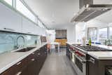 Kitchen of Cantilevered Roof Home by Steve Simmons