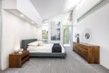 Bedroom in Cantilevered Roof Home by Steve Simmons