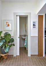 The couple added a half-bathroom to the main level and replaced the tiling, costing them around $6,600 combined.