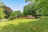 The sprawling Samuel and Dorothy Eppstein House is built into its surrounding lush lawn.  Photo 9 of 11 in Houses for hire by Sse Giaoshouging Whaley from Here’s a Rare Opportunity to Buy Two Frank Lloyd Wright Homes for $4.5M
