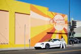 Backdrop co-founder Natalie Ebel arrives at Los Angeles’s Sunbeam Vintage in a custom Porsche Taycan for a morning of thrifting with Dabito. 