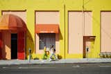 Dabito and Natalie leave Sunbeam with thrifted finds for Dabito’s office—a retro yellow lamp and fringed fuschia pillow. "The colors are always the jumping point," says Dabito of his thrifting strategy. "Like if I see a fuchsia color, a yellow…it’s like a moth to a flame."