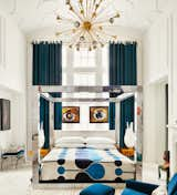 Maximalism: Bold, Bedazzled, Gold, and Tasseled Interiors&nbsp;features an introduction by former Barneys creative director and legendary window dresser Simon Doonan. The eye-catching bedroom of the New York apartment Doonan shares with his husband, interior designer Jonathan Adler, is one of the many extravagant maximalist interiors featured in the new book from Phaidon.